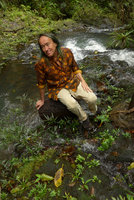 Patrick Blanc sitting among two rheophytic species, Elatostema humile and Ficus bambusifolia, Colo-I-Suva, Viti Levu, Fiji, Aug. 2016