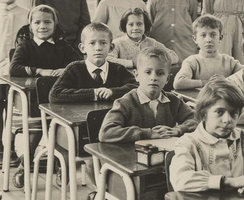 Patrick Blanc sitting in classroom, 1962