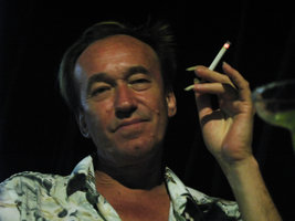 Patrick Blanc smoking at night, happy after discovering five new, yet undescribed Begonia species, B. blancii, B. elnidoensis, B. hughesii,a, B. taraw and B. tagbanua, Sabang, Palawan, Philippines, Feb. 2009