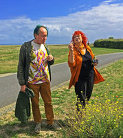 Patrick Blanc somewhat doubtful while tasting the wild arugula salad offered by Noemie Vialard, Cancale, France, Aug. 2019