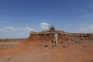 Patrick Blanc under a flowering Aloe in a desolated volcanic area, Sodo, Wolayta, Ethiopia, Jan. 2019
