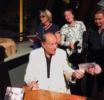 Patrick Blanc waiting for the signature by Charles Dumont of his new song album at 90 years old, just after his show at the Eiffel Tower, Paris, 3rd Oct. 2019