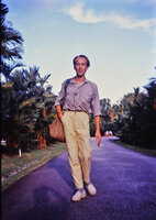 Patrick Blanc walking and smoking in Botanic Gardens, Singapore, July 1987