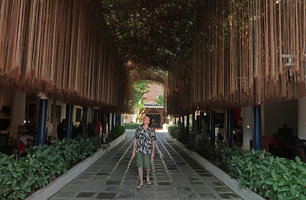 Patrick Blanc walking under the canopy tunnel of Cissus verticillata roots, Tugu hotel, Blitar, Java, May 2018