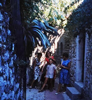 Patrick Blanc with his mother and sisters under Agave americana in a narrow canyon street of Eze village, France, Aug. 1964