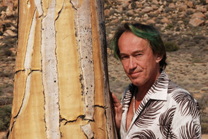 Patrik Blanc and Aloe dichotoma, Namaqualand, South Africa, Sept. 2010