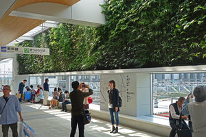 Shinkansen station Vertical Garden and passengers, Yamaguchi, Japan