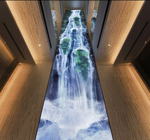 Universe of Water Particles, the digital waterfall by TeamLab integrating the photos of plants by Patrick Blanc, just in front of his vertical garden, Ginza Six, Tokyo